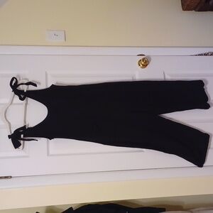 Zesica, sz S, (runs big),black romper, side zip, ties at shoulder, 2 pockets